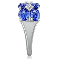 Blue Sapphire And Diamond Accent Ring In 18K White Gold