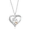 1/10 Ct. Tw. Diamond Heart Pendant In Sterling Silver & 10K Rose Gold