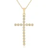 Diamond Cross Pendant In 14K Yellow Gold (1/7 Ct. Tw.)