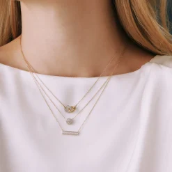 Diamond Halo Pendant In 14K Yellow Gold (1/4 Ct. Tw.)