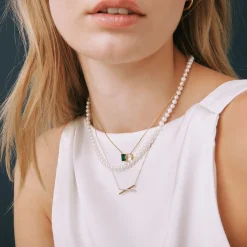 Diamond 'X' Necklace In 14K Yellow Gold (1/10 Ct. Tw.)