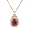 Garnet & 1/7 Ct. Tw. Diamond Pendant In 10K Rose Gold