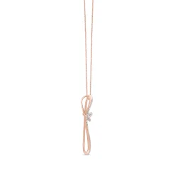 Lab Grown Diamond Cross Pendant In 10K Rose Gold (1/5 Ct. Tw.)