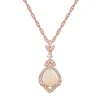 Opal, Pink Sapphire & 1/5 Ct. Tw. Diamond Pendant In 10K Rose Gold