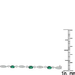 Oval Emerald And Diamond Bracelet In 10K White Gold (1/3 Ct. Tw.)