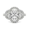 Oval Moissanite Three-Stone Ring With Halo In 14K White Gold