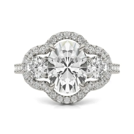 Oval Moissanite Three-Stone Ring With Halo In 14K White Gold