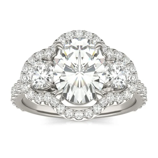 Oval Moissanite Three-Stone Ring With Halo In 14K White Gold