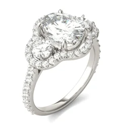 Oval Moissanite Three-Stone Ring With Halo In 14K White Gold